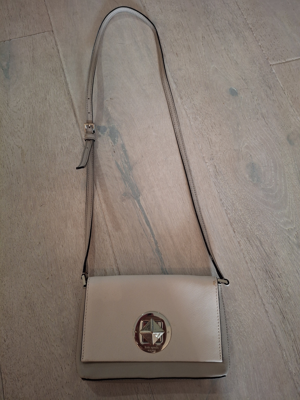 kate spade Cream Leather Crossbody with Gold Emblem